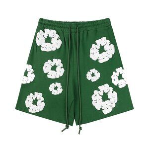 Denim Tears Green Shorts With White Flower Print